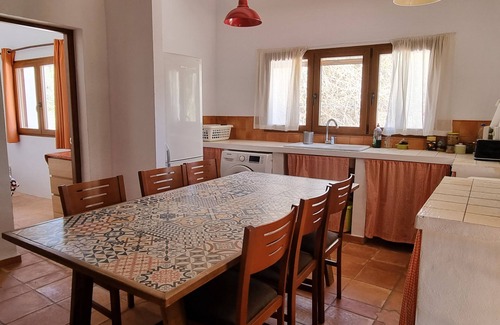 Beniarbeig House | Peaceful and relaxing rustic house with a spacious garden surrounded by trees.