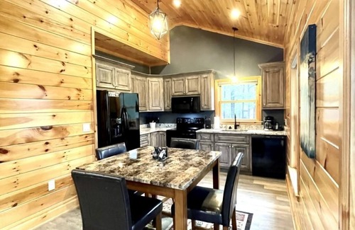 Tellico Plains Cabin | Peaceful family cabin near fishing with over 100 acres of mountain and field trails to explore! by RedAwning