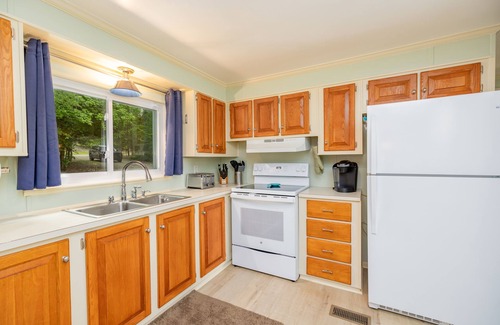 Wise House | Peaceful Lakefront Home w/Hot tub, Dock, Firepit, Kayak, Cornhole, Ramp nearby