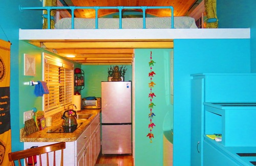 Winchester House | Peaceful Secret Gardens Tiny Home - loft & stairs lead to a Queen Size Bed