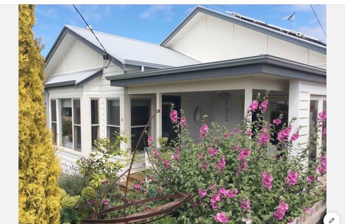 Queenscliff Apartment | Pelicans water view apartment. Lounge,Kitchen,verandah,Queen bedroom,bathroom.