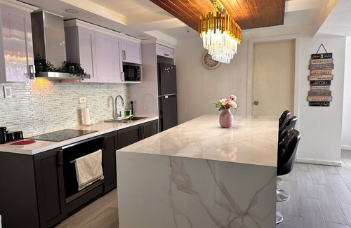 San Fernando Condo | Penthouse 2-bedroom condo in adorable San Fernando with WiFi, AC, 8pax+2kids3yo.