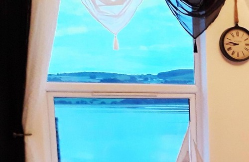 Fahan Apartment | PENTHOUSE APARTMENT overlooking the beach views of Inch Island,Fahan Marina etc.