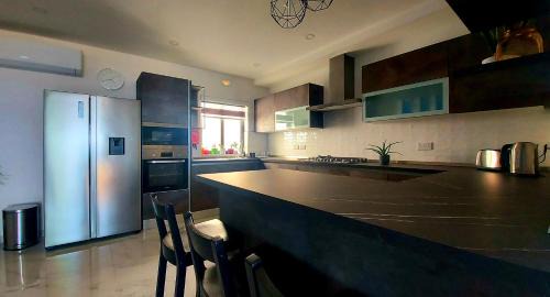 Xaghra Apartment | Penthouse, Sea Views and Private Roof Top Pool