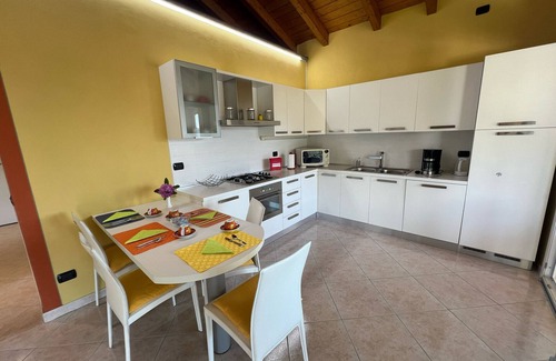 Cissano Apartment | Penthouse Valentino with terrace lake view