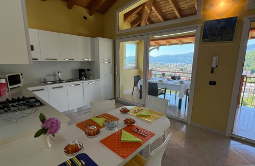 Cissano Apartment | Penthouse Valentino with terrace lake view