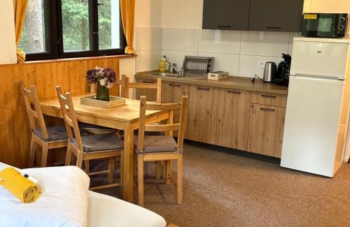Doksy House | Penzion a Restaurace Kamínek