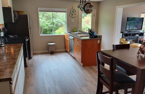 Heriot Bay Apartment | Perfect getaway. Spectacular mountain and ocean view. Steps to the beach.