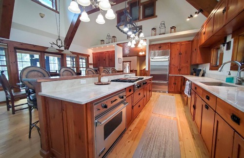 Woodruff House | Perfect retreat for family fun! Private wooded lot on Little Spider Lake