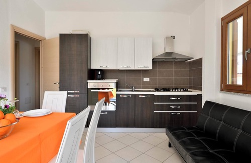Cala Gonone Apartment | Pet Friendly Apartment 'Casa con vista mare e monti' with Sea View, Terrace & Wi-Fi