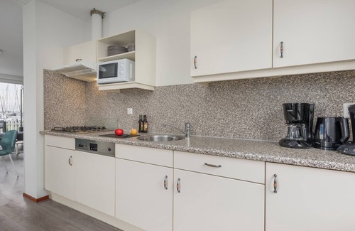 Volendam Apartment | Pet-Friendly Garden Getaway