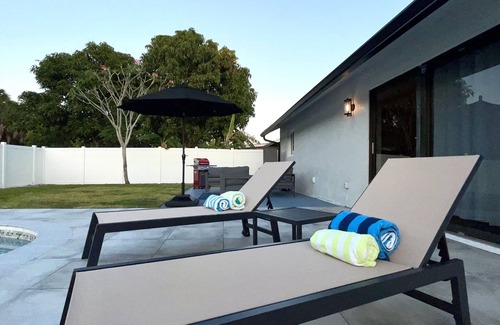 Royal Palm Beach House | Pet friendly Royal Palm oasis with pool