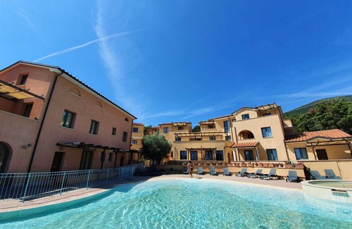 Cavo Apartment | Pet-friendly Vacation Apartment La Pergola al Cavo 107 with Mountain View, Pool & Terrace