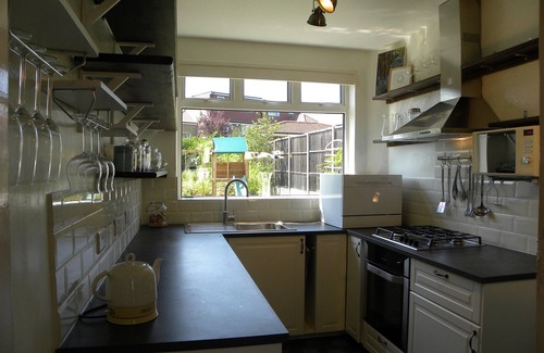Harrow Weald House | Pets welcome at family home with piano and lovely garden with parking for two.