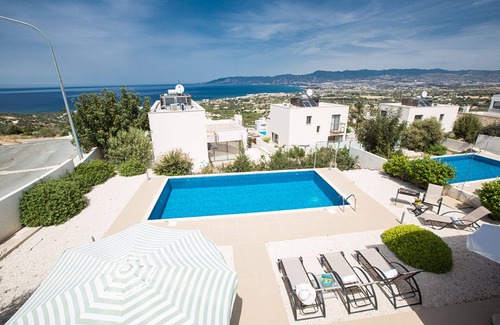 Lakatamia Villa | Picture Relaxing Beside Your Private Pool in Your Villa Reading Your Favourite Book