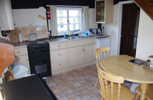 Yarpole Cottage | Picturesque Black And White Cottage