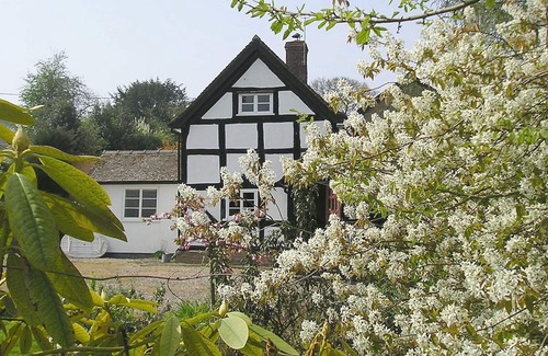 Yarpole Cottage | Picturesque Black And White Cottage