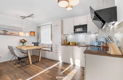 Busum Apartment | Pier 12b - for 4 persons, parking space, quiet location, modern, cosy terrace