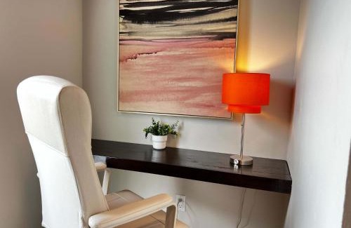 Downtown Apartment | Pink Sunrise Energetic Studio #7 at Ports on Portland, King Bed and Bold Decor