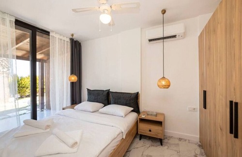 Meselik Apartment | Pleasant Home with Shared Pool in Bodrum