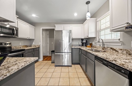 Bentonville House | Pool, ping-pong and foosball tables! Kid, bike, dog & work friendly.