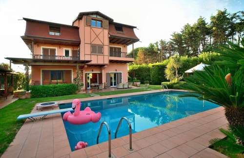 Skala Oropou Villa | Pool Villa DesmiranDive in the pleasure and relax by the pool, close to the sea.