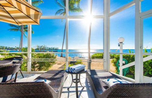 Rum Point Apartment | Pools of the Kai 6 - Beachfront Condo with Private Pool Atrium, Modern Kitchen, and Outdoor Grill