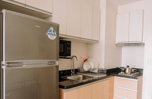 Iloilo Apartment | Poolside Bliss & Serenity