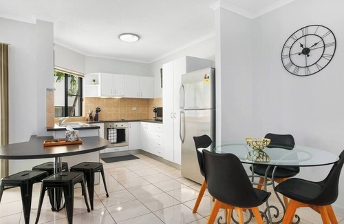 Manunda Apartment | Poolside Living in Contemporary Tropical Retreat