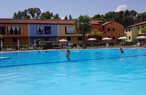 Lido Condo | POSEIDONE-Refined apartments in village with swimming pool