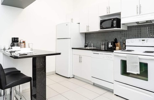 Downtown Winnipeg Condo | Premium 2BD Loft DT Heated Parking Rooftop Patio BBQ Gym Coffee