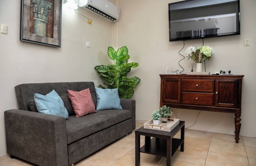 Newtown Apartment | Prime Location + Rooftop Access + City Views + Queens Park Savannah + Walkable
