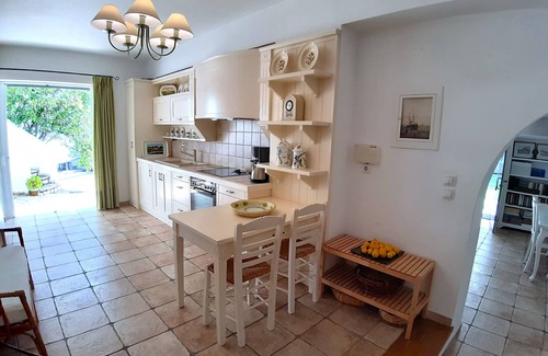 Skaloma Villa | Private beachfront villa in traditional village setting