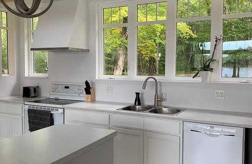 Clare Ski Chalet | Private cottage on 8 wooded and flower-filled acres at Lake Wentworth and the Wentworth River