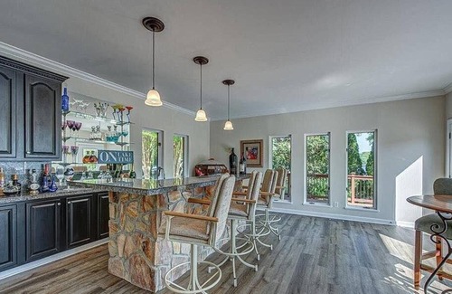 Steele Creek House | Private Lakeside Oasis - Newly Renovated - Spacious Interior - Movie Theater
