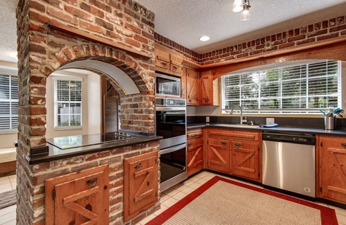 Orange Park House | Private Pool |1/2 Acre Wooded Lot |Feels Like an Authentic English Cottage |Fenced |Dogs Ok |3 Bikes