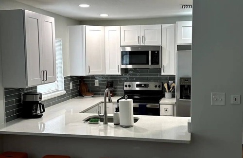 Palm Harbor House | Private Pool, Golf Cart, & Completely Renovated!