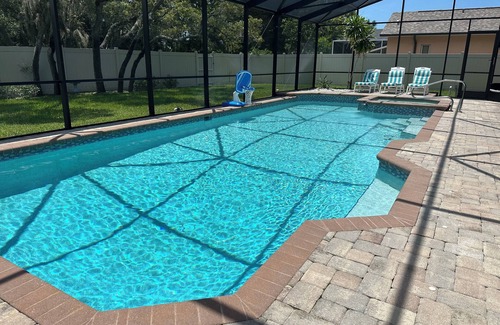 Palma Sola House | Private Pool Home 4 bd 3 ba with 2 King Master Suites Sleep 10 near AMI and IMG