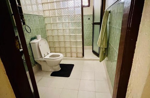 Chukwani House | Private Room with Garden Oasis