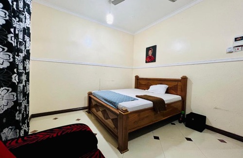 Chukwani House | Private Room with Garden Oasis