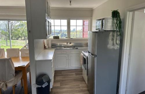Te Akau House | Puketotara Station Farm Cottage Three bedrooms
