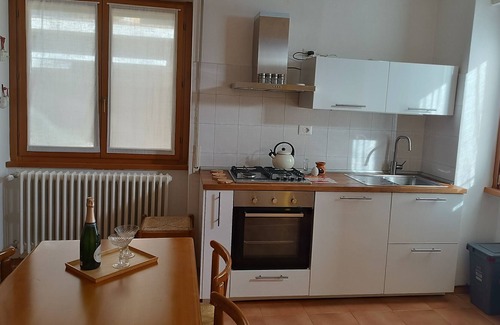 Brunate Apartment | Purple White Apartment