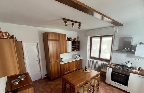 Brunate Apartment | Purple White Apartment