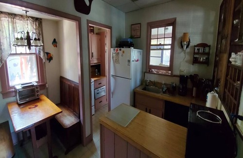 Surf City House | Quaint House Steps To The Beach with great backyard space for outside dining