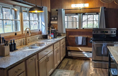 Wooster Cabin | Quaint Newly Remodeled Cabin with Stone Fireplace - Private Hot Tub - King Bed