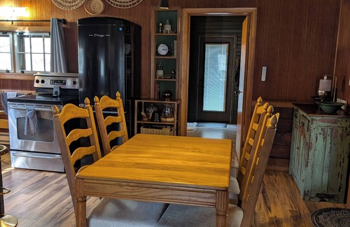 Wooster Cabin | Quaint Newly Remodeled Cabin with Stone Fireplace - Private Hot Tub - King Bed