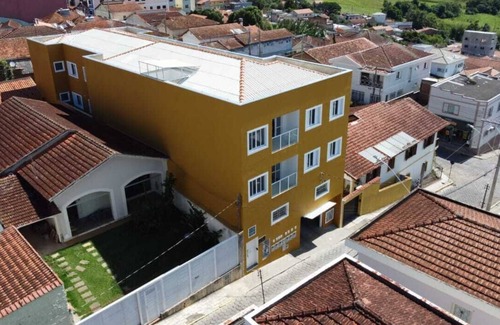 Paraisopolis Apartment | Quarto Família Superior na Pousada Verissimus