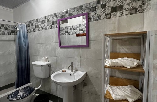 Port of Spain House | Queen's Comfort Inn