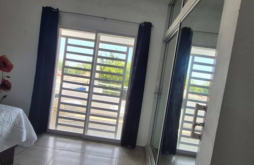 Nagua Apartment | Quiet and clean 2-bedroom apartment in Nagua Suburb with AC and private parking
