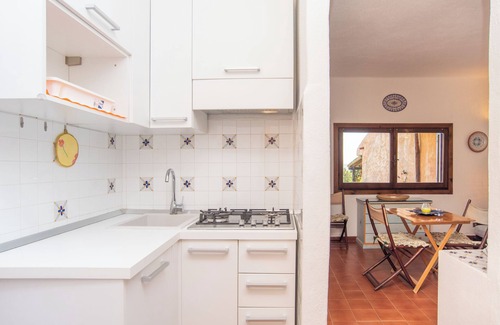Punta Sardegna Apartment | Quiet Holiday Apartment with Terrace with Sea View; Parking Available; Pets Allowed